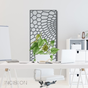 office mockup with a decorative metal screen with a plant growing up it